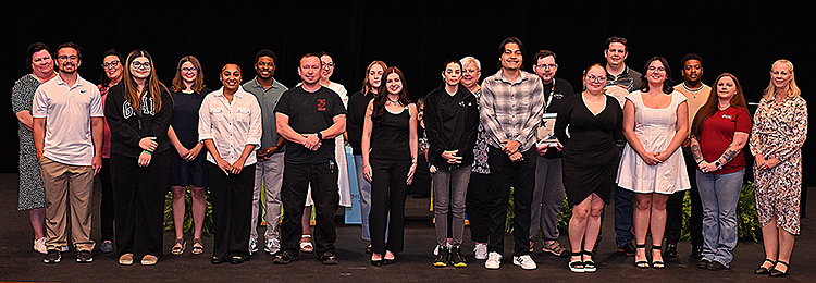 Phi Theta Kappa Inductees on stage.