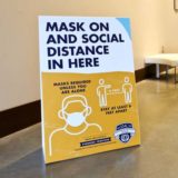 COVID-19 Mask On Social Distance in here sign