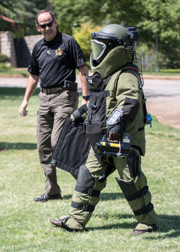 Bomb detonation officer in full protection suit
