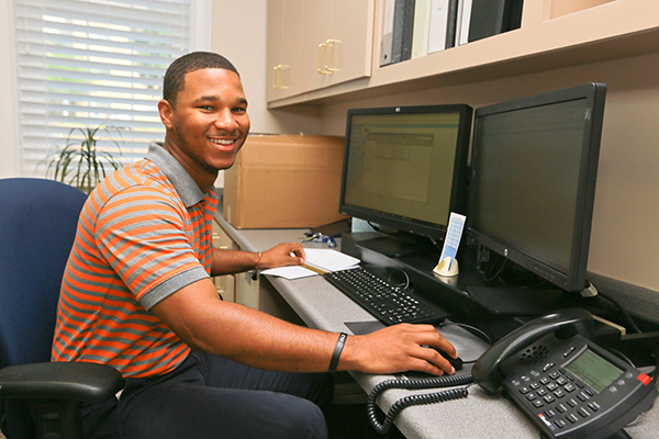 man working at computer