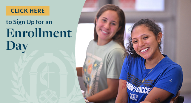 two female students at the dining hall smiling