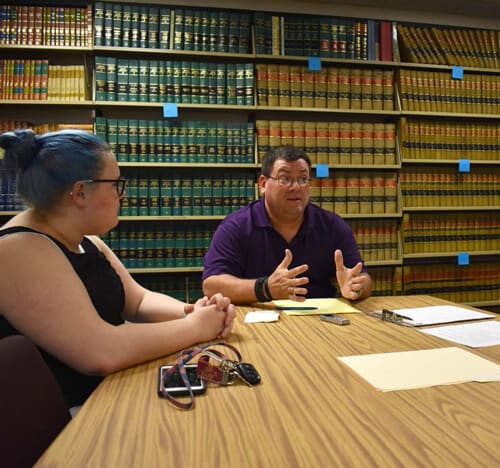 People meeting in library 