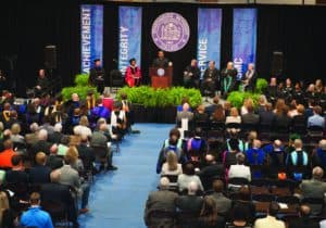 Audience listening to speaker at inauguration ceremony of Scott Cochran